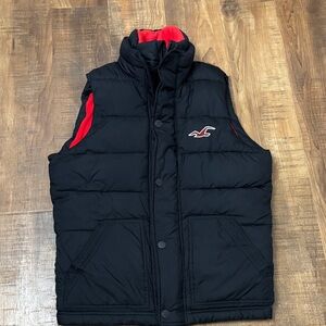 Hollister men’s Size small  Navy Puffer Vest with Red fleece lining